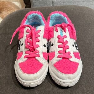 Women’s Pink and White leather and shearling Sneakers.